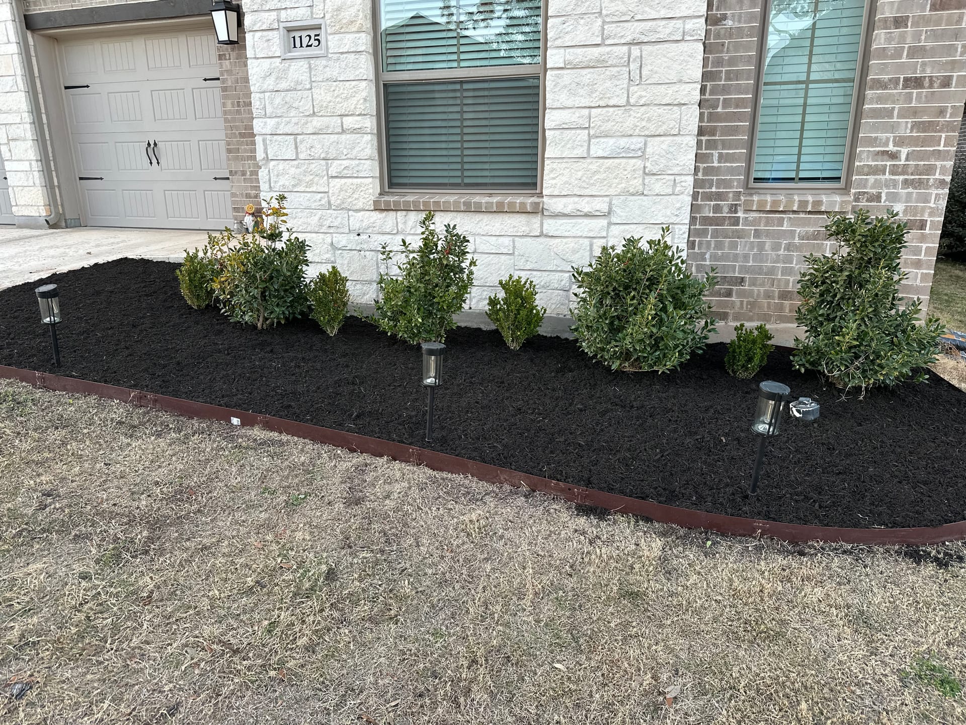 Fresh Mulch Installation Brings Georgetown Home's Front Bed Back to Life