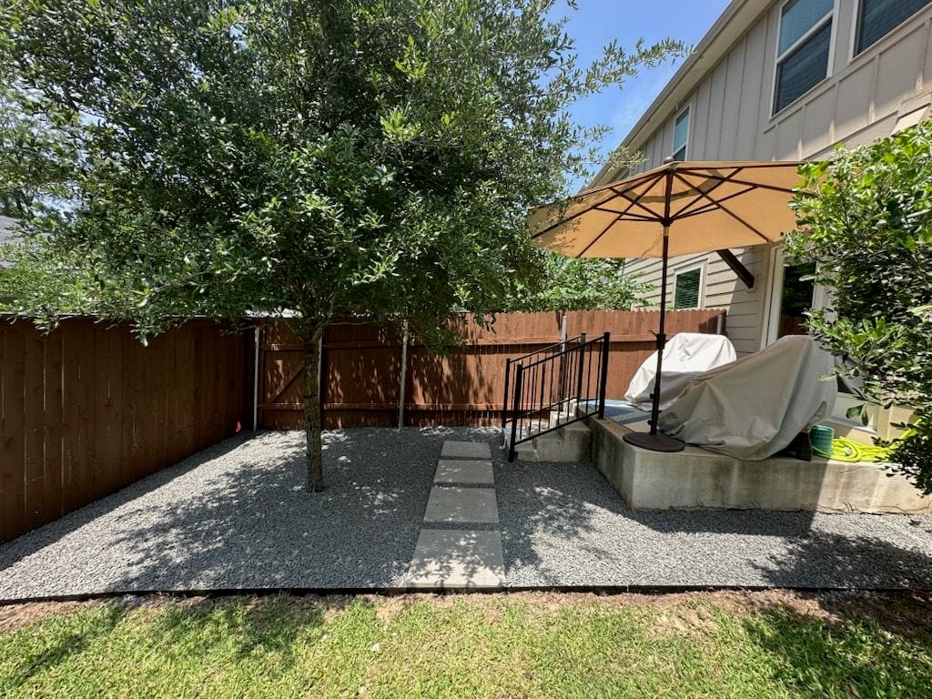 Backyard Transformation with Black Star Gravel and Pavers